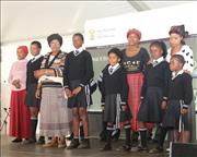 School children (with their parents) in their new school uniform